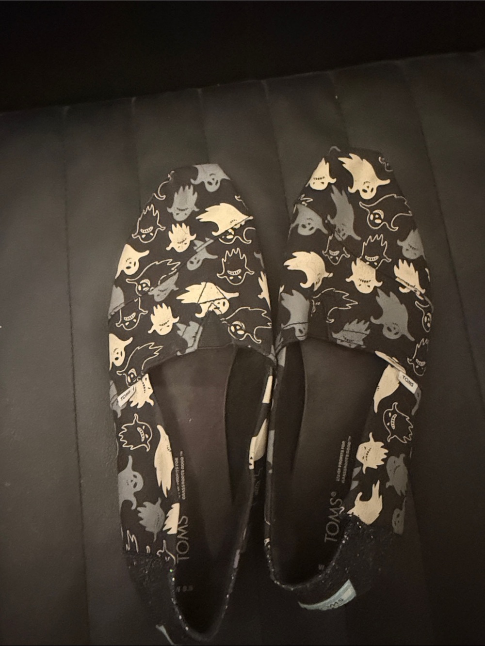 Toms Black Canvas Slip-Ons with Gray and Cream Ghost Print